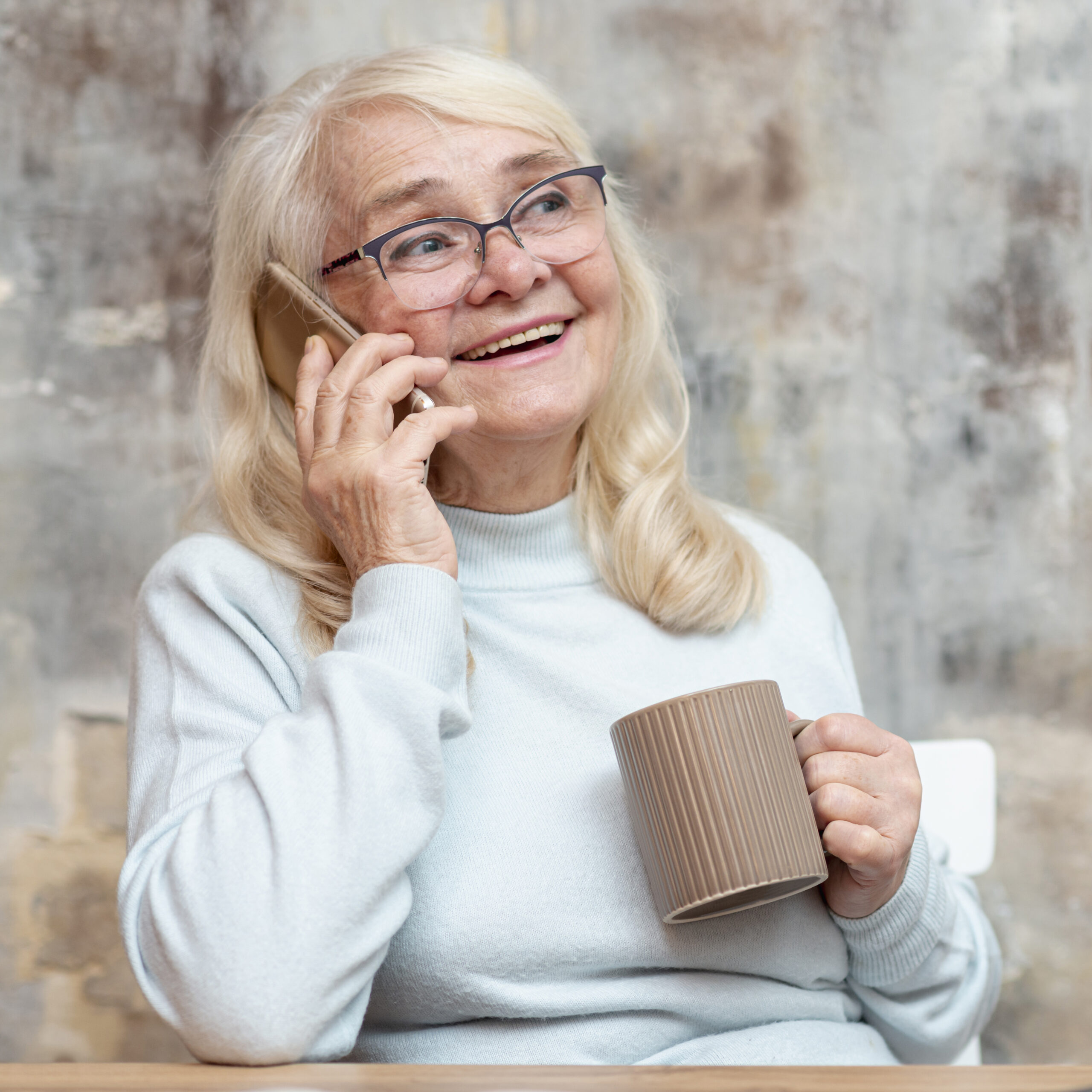 Caregiver talking with a loved one on the phone